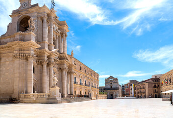 Fototapeta premium A wide-angle view of the square and the cathedral in Syracuse, a UNESCO World Heritage Site, built on the site of an ancient Greek temple dedicated to the goddess Athena