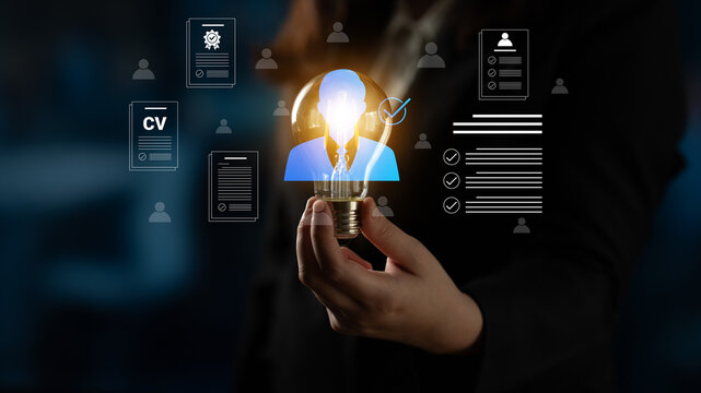 Engaging image showcasing the concept of recruitment and job search with resumes and candidate profiles, symbolized by a light bulb icon, enhancing professional development and innovation. Cyphers
