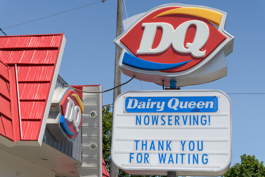 shaped logo signage outside Dairy Queen or DQ, an ice cream shop and fast food quick-service restaurant, located here at 2882 Kingston Rd, Scarborough, Toronto