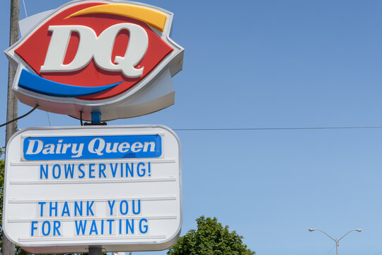 shaped logo signage outside Dairy Queen or DQ, an ice cream shop and fast food quick-service restaurant, located here at 2882 Kingston Rd, Scarborough, Toronto