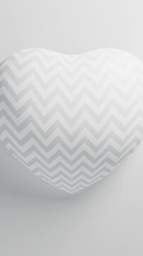 White sawtooth heart pulsating on a white background, Valentine s Day 3D loop animation. Vertical video.