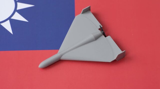 A Shahed drone featuring a prohibition symbol on the taiwanese flag as a conceptual background