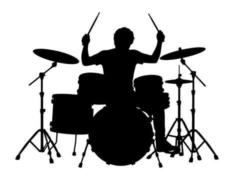 Silhouette of a drummer playing a full drum set with drumsticks raised in front view