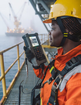 Offshore Energy Engineer Monitoring Telemetry on Rig