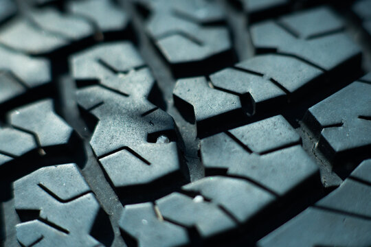 Detailed Close-Up of Car Tire Tread Pattern