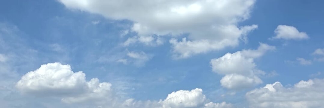 Cloudscape, Timelapse of Vivid Blue Sky Background with Fluffy White Cumulus Clouds for Wide Wallpaper and Banner