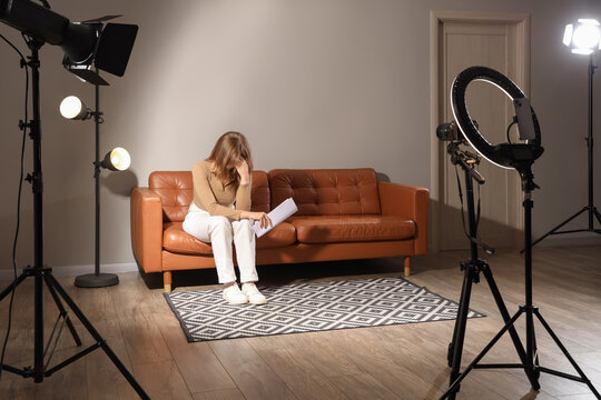 Young actress recording her audition in room