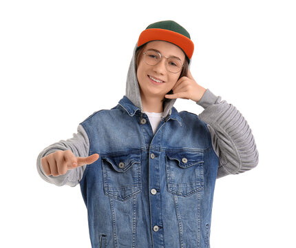 Cool teenage boy showing "call me" gesture on white background