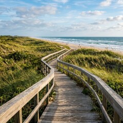 Obraz premium Beach Pathway Through Sand Dunes Leading to Ocean, Peaceful Coastal Landscape and Travel Concept