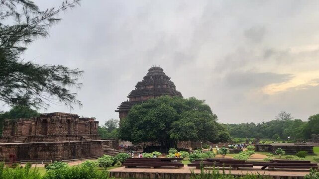 13th Century Konark Sun Temple Complex with Lush Green Gardens and Trees. Historical Sun Temple Ruins and Stone Carvings Landscape in Konark Odisha.