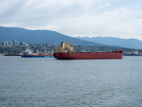 Vancouver BC, Canada - May 1, 2019: Cargo ships in Vancouver Harbour