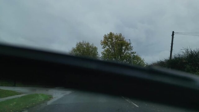 Urban Streets View of British City of England Great Britain. Car Mounted Wide Angle Camera Time Lapse Footage Was Captured During Mostly Rainy and Cloudy Day of 9th November, 2025.