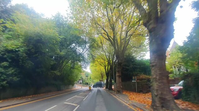 Urban Streets View of British City of England Great Britain. Car Mounted Wide Angle Camera Time Lapse Footage Was Captured During Mostly Rainy and Cloudy Day of 9th November, 2025.