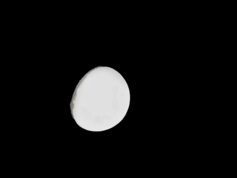 view of the waning gibbous moon or half full moon in the night sky