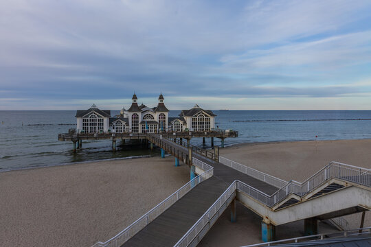 Iconic Sellin pier and wooden walkway stretching into Baltic Sea on Rugen Island