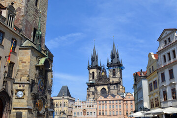 Fototapeta premium Prague old town square with tyn church twin spires and medieval astronomical clock for travel background and city poster