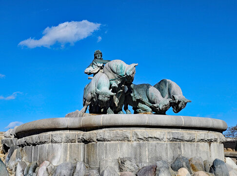 Wonderful views of Copenhagen, Denmark, with colorful houses and sculptures in beautiful weather