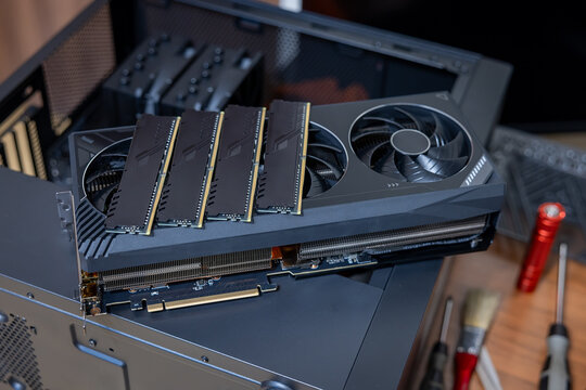Four DDR RAM modules and a powerful expensive graphics card are high-end, costly, scarce components of a modern powerful gaming PC. PC assembly or upgrades