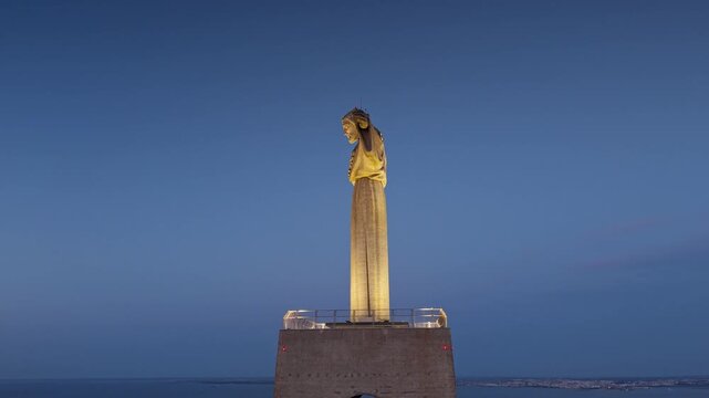 Illuminated Cristo Rei Monument Against Deep Blue Sky