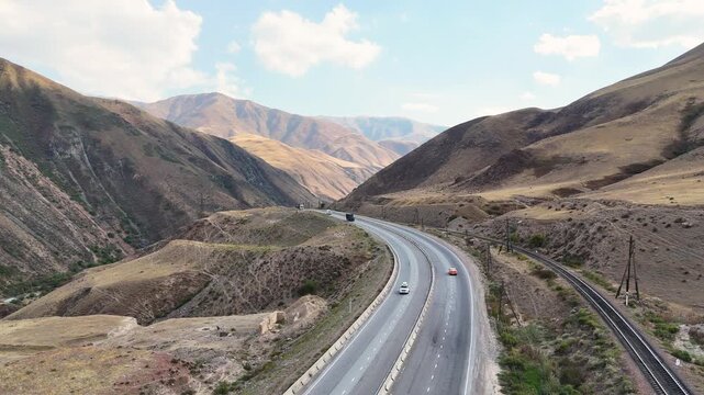 Issyk-Kul, Kyrgyzstan October,17,2025: A beautiful highway running beside Issyk-Kul Lake