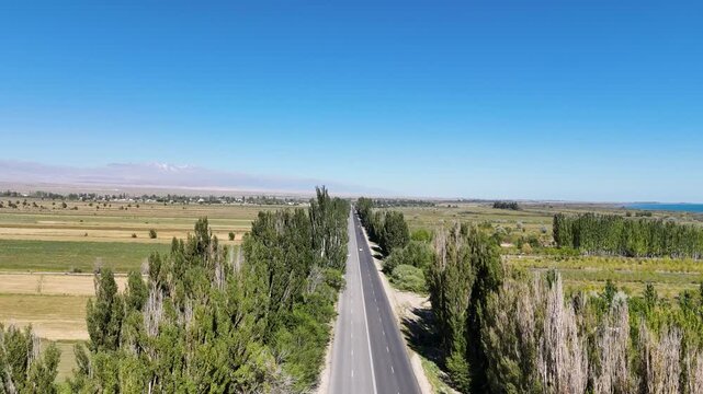 Stunning drone view of north side road of Issyk-Kul lake