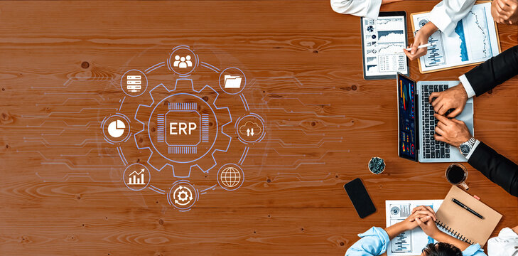 Team Collaboration on Enterprise Resource Planning Implementation with Digital Icons Illustrating Business Management and Analytics. Entropy.