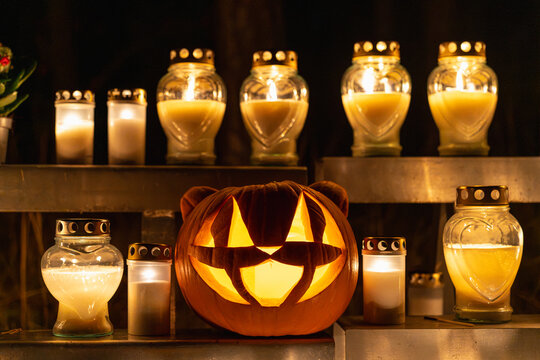 Carved pumpkin lantern with candles at Skogskyrkogarden