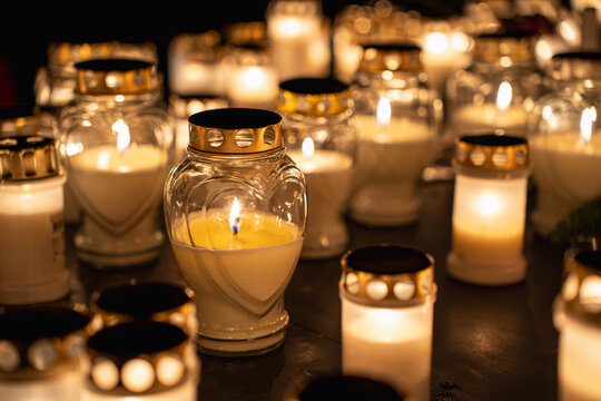 Candlelight memorial at cemetery for All Saints Day