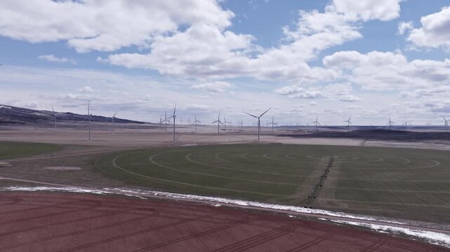 Aerial View of a Wind Farm Amid Farmland on the Rural Plains of Bridger, Montana