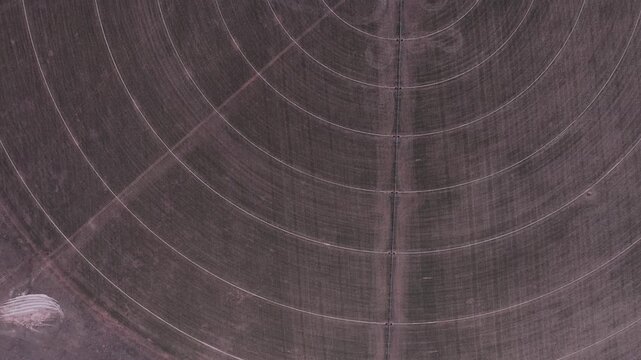 Aerial View of a Wind Farm Amid Farmland on the Rural Plains of Bridger, Montana