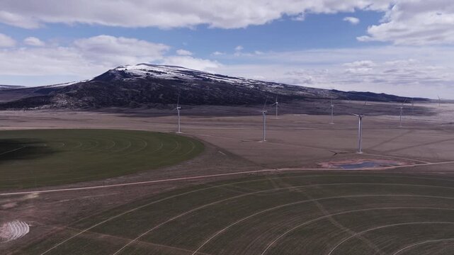 Aerial View of a Wind Farm Amid Farmland on the Rural Plains of Bridger, Montana