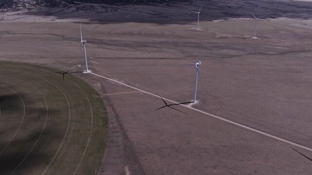 Aerial View of a Wind Farm Amid Farmland on the Rural Plains of Bridger, Montana