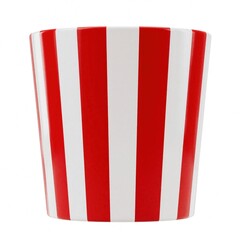 Fototapeta premium Empty red white striped popcorn bucket stands on white background. Minimalist paper container for cinema snacks isolated in studio. Concept of film theater entertainment food box, movie night