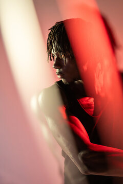 African man in dramatic red light portrait