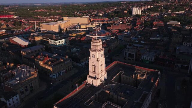 Barnsley Town Hall aerial reveal of city skyline and surrounding villages, 4K.