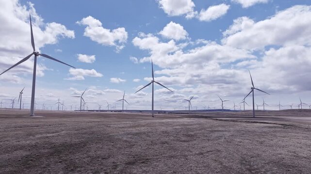 Aerial View of a Wind Farm Amid Farmland on the Rural Plains of Bridger, Montana