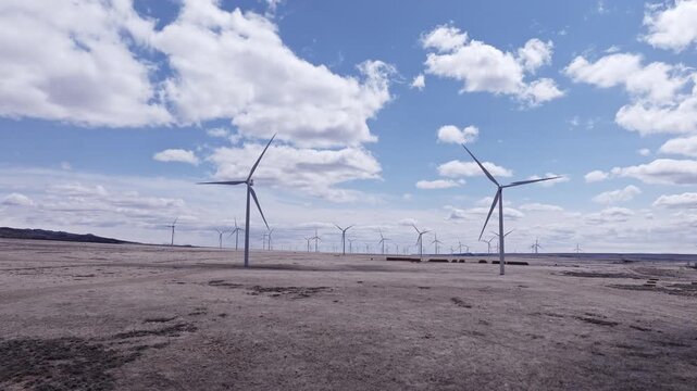 Aerial View of a Wind Farm Amid Farmland on the Rural Plains of Bridger, Montana