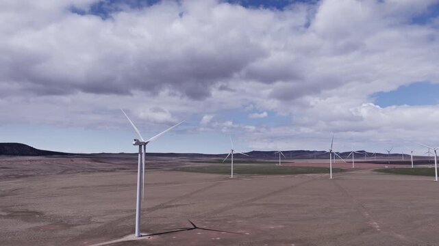Aerial View of a Wind Farm Amid Farmland on the Rural Plains of Bridger, Montana