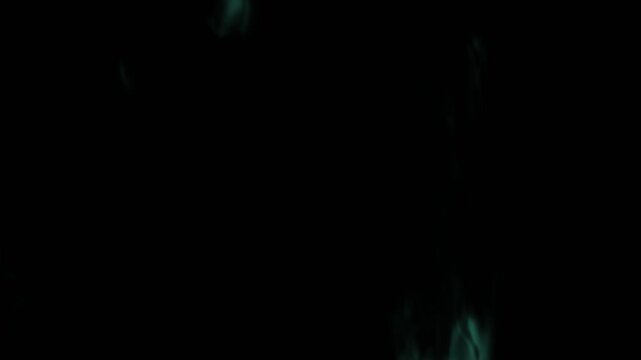 Ethereal 4K green cyan thin spectral ghost white wisps curling in a seamless loop animation with a transparent background overlay for motion graphics and cinematic video visual effects.