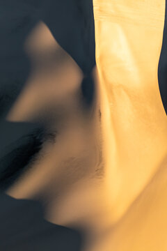 Abstract sand dune pattern with smooth wind-shaped texture