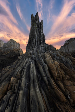 Dramatic Asturian sea stack and rock spires at sunset