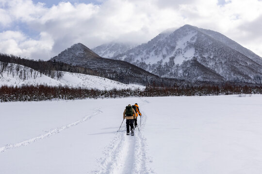 Backcountry splitboard touring in snowy Japan mountains