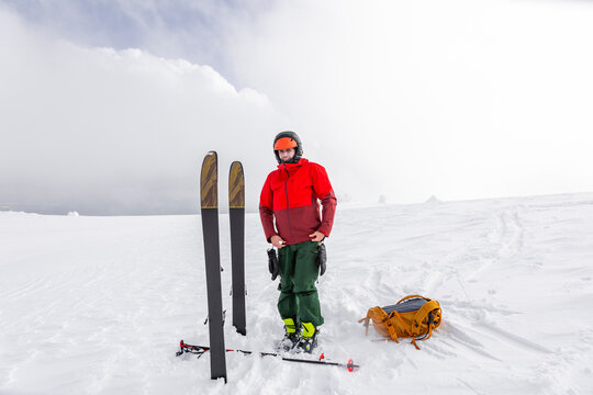Backcountry skier in Japan preparing splitboard tour
