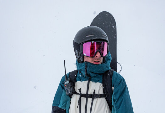 Snowboarder prepared for Hokkaido's snowy mountain slopes