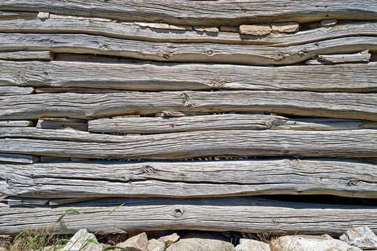 Weathered logs on the exterior wall of an abandoned cabin near Ruby Valley, Nevada, USA