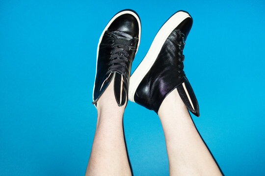 Unique black sneakers with bunny ear design