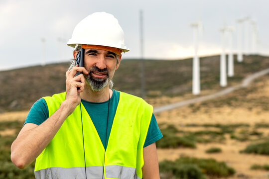 Wind farm technician and renewable engineer on site call