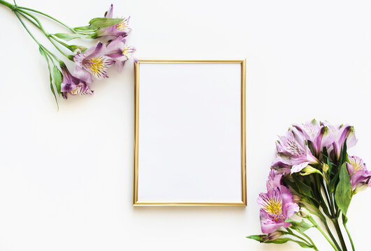 Alstroemeria bouquet with empty frame on white background