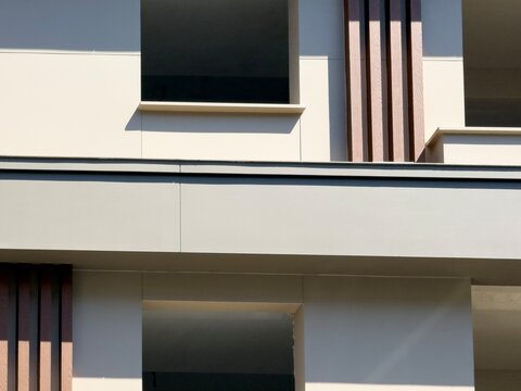 Modern building facade with geometric window and column