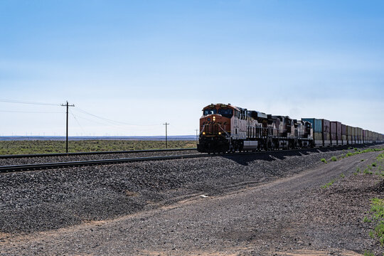 New Mexico 42 Crossing 7-19-2026 Willard NM USAWest Bound BNSF stack train crossing New Mexico Highway 42 at Willard New Mexico on the BNSF Clovis Sub